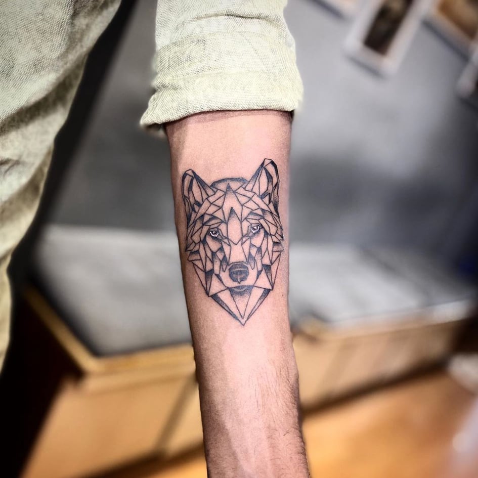 Small Tattoo Ideas with Meaning - Wolf Tattoo