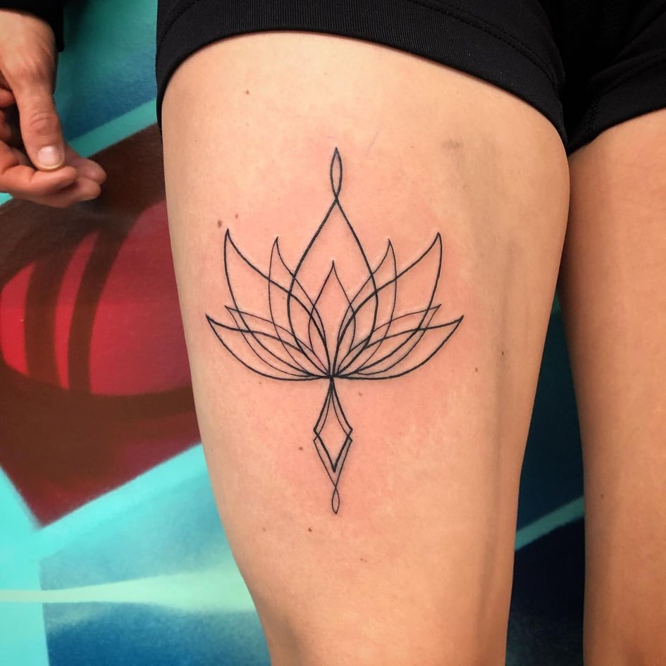 Stick and Poke Tattoo  Hand poked thigh tattoo including lotus flowers