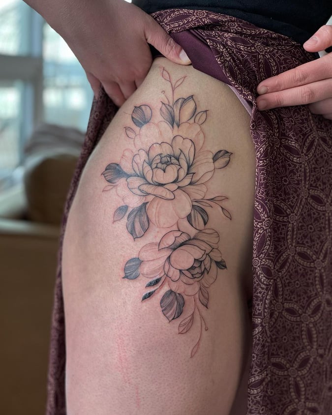 Tiny flower bundle tattoo on the thigh  Tattoogridnet