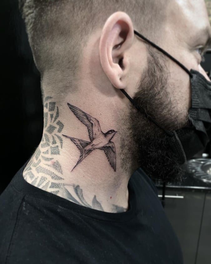 Realistic Neck Bird Tattoo by Three Kings Tattoo