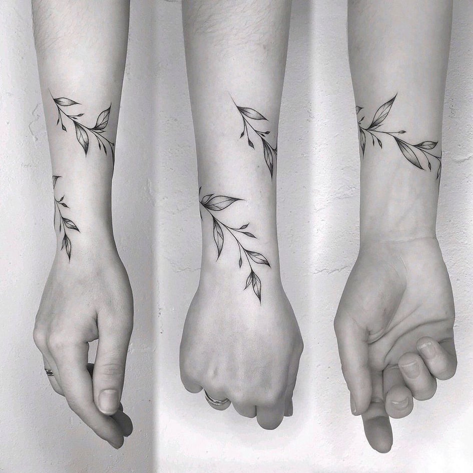 person with black leaves finger tattoos photo  Free Grey Image on Unsplash