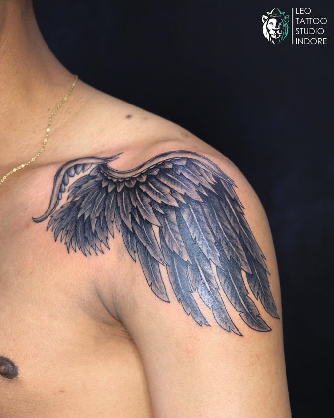 Wing tattoo done on the shoulder blade illustrative