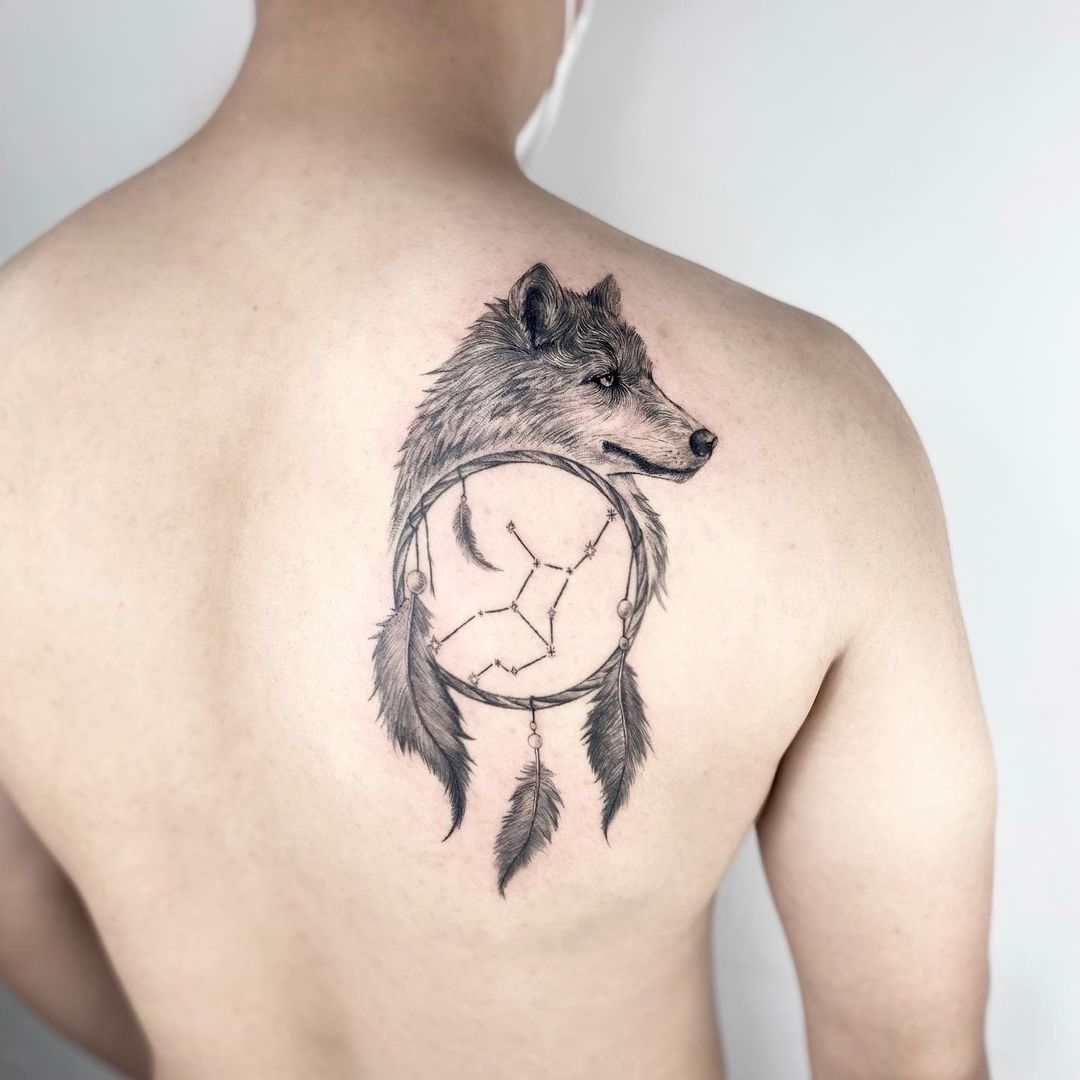 Lexica  A geometric minimalist wolf forming a strings of dream catcher  tattoo
