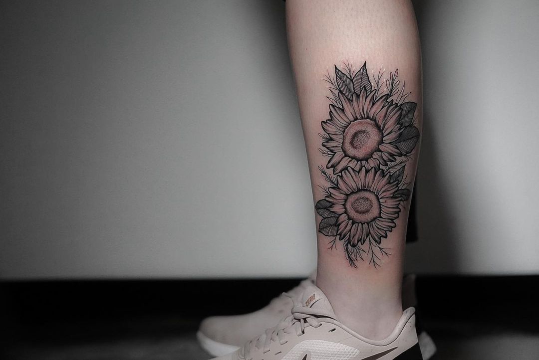 Sunflower tattoo on the inner arm