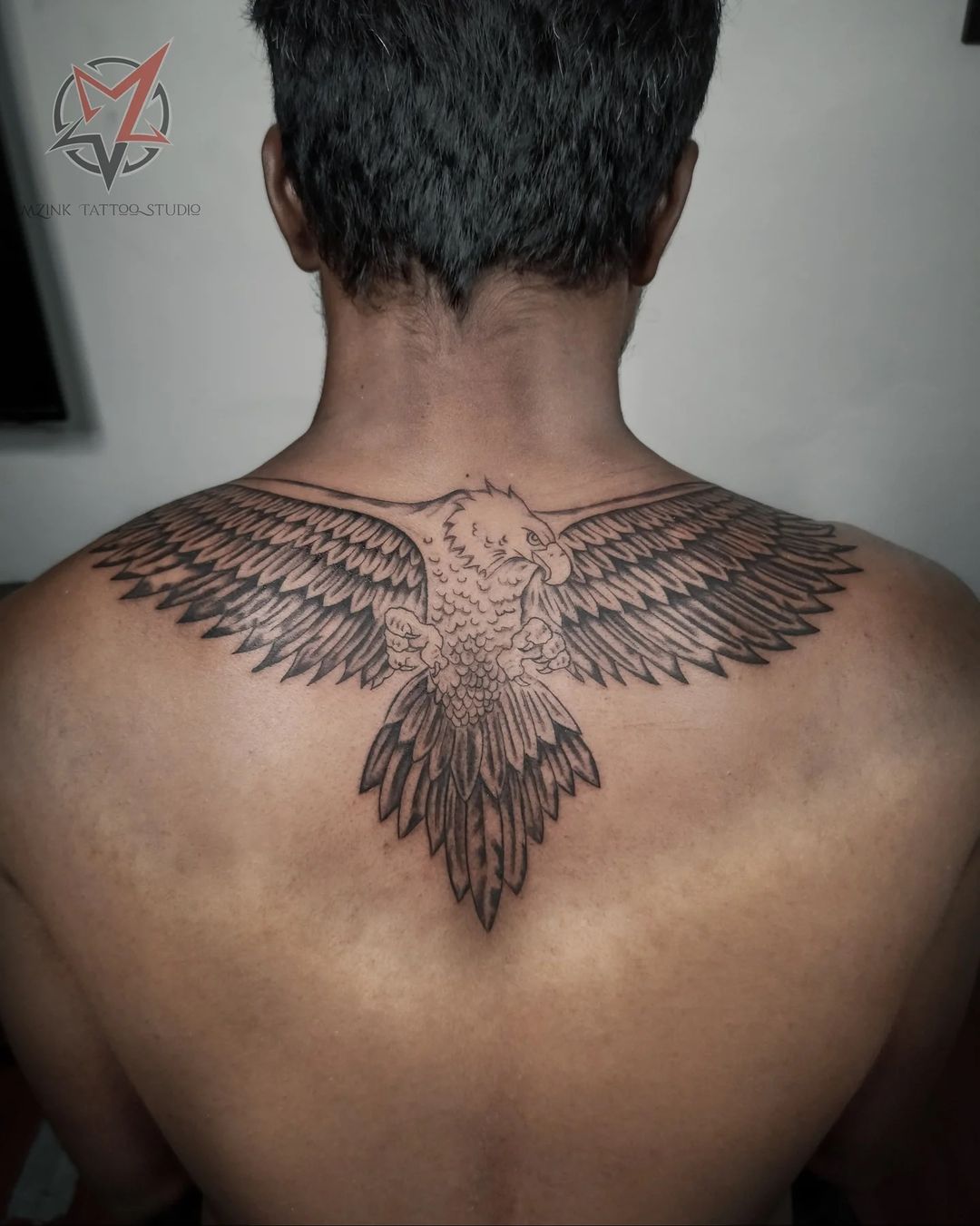 Flying Eagle Tattoo On Upper Back